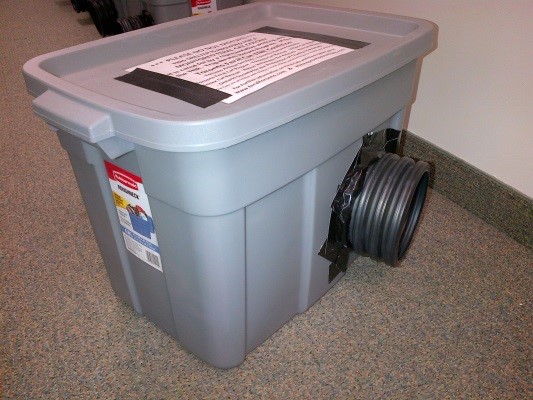 Cat shelter flled with straw